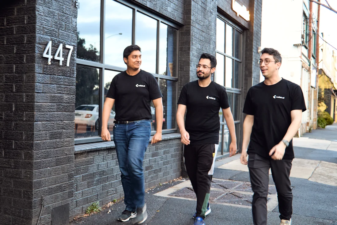 Calab.ai colleagues walking together outside the Melbourne office