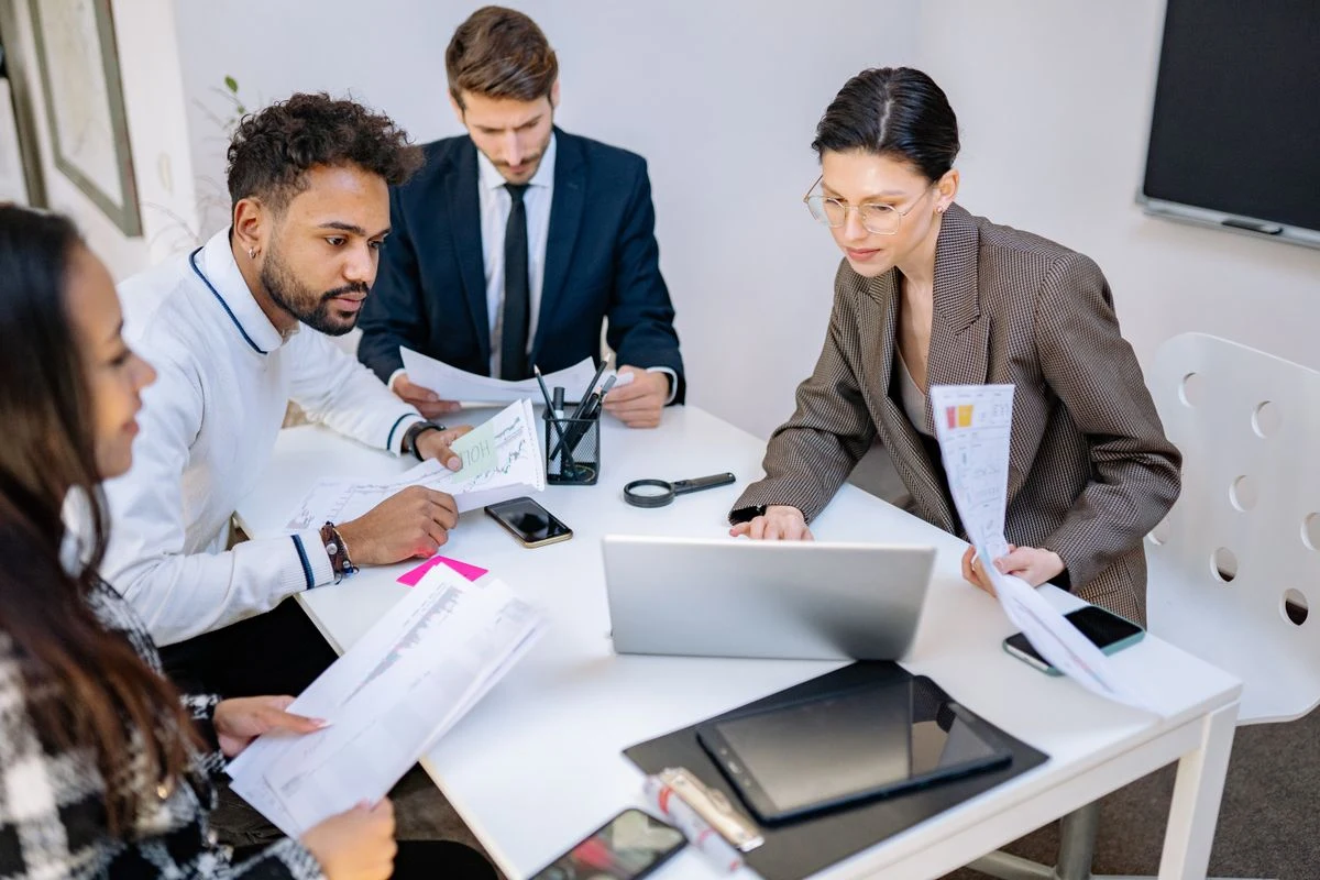 A team reviewing business information together